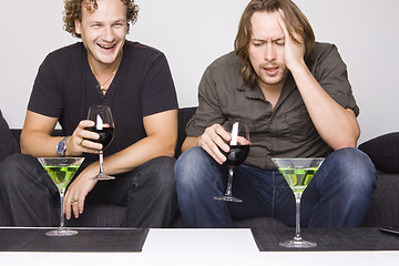 Image showing two friends drinking at home