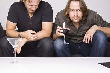 Image showing two friends drinking at home