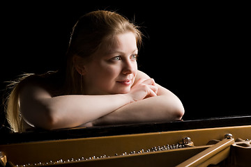 Image showing Dreamy pianist