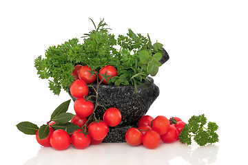 Image showing Tomatoes and Herb Leaf Selection  