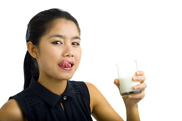 Image showing woman drinking milk