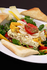 Image showing baked feta cheese on lambs lettuce