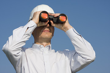 Image showing Engineer searching with binocular