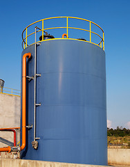 Image showing Blue oil storage tank