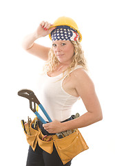 Image showing attractive woman contractor with tools and hard hat helmet