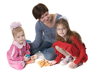 Image showing mother plays with two daughters