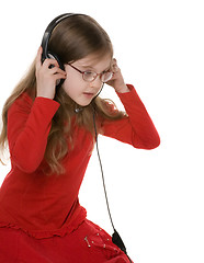 Image showing Little girl in headsets