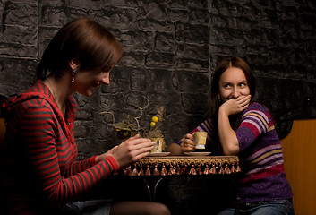 Image showing Two friends in a restaurant