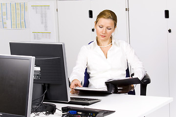 Image showing beautiful young woman at the office