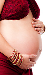 Image showing Pregnant woman holding belly