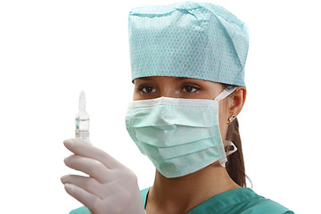 Image showing Female doctor with a vial