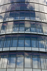 Image showing clouds reflection on office building