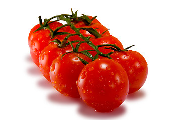 Image showing Tomatoes isolated on white with clipping path