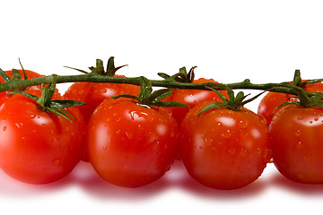 Image showing Tomatoes isolated on white with clipping path