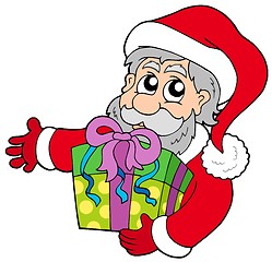 Image showing Santa Claus holding gift