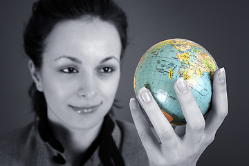 Image showing Globe in a girl's hands