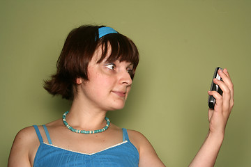 Image showing young woman calling by cellular phone