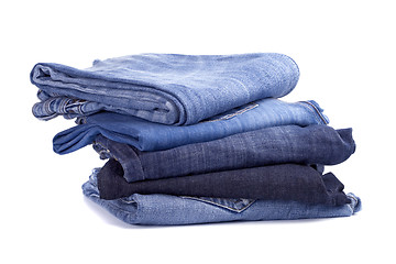 Image showing stack of blue jeans