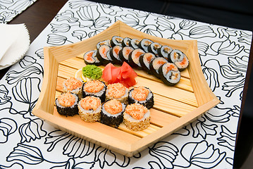 Image showing sushi on wood plate