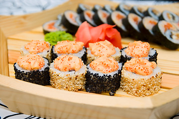 Image showing sushi on wood plate