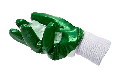 Image showing Green glove with block