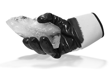 Image showing Black glove and block of ice