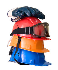 Image showing Many colored hardhats, gloves and goggles