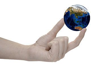 Image showing Earth in hand