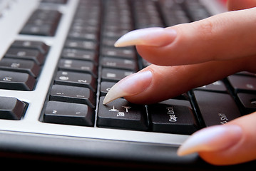 Image showing Female working on personal computer