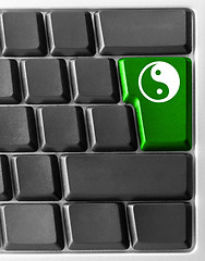 Image showing Computer keyboard with yin yan key