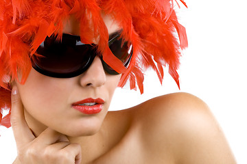 Image showing woman with red feather wig and sunglasses