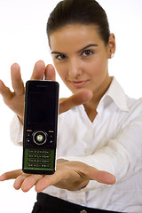 Image showing businesswoman presenting a mobile phone