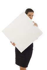 Image showing businesswoman holding a blank board