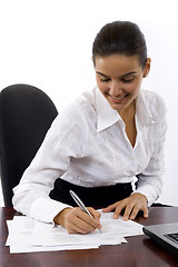 Image showing Business Woman signing documents