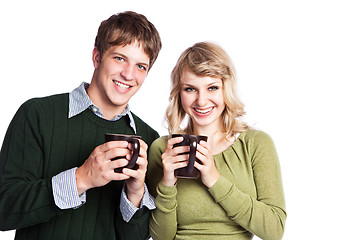 Image showing Caucasian couple holding coffee cups