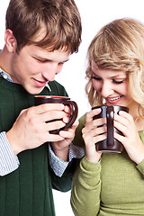 Image showing Caucasian couple holding coffee cups