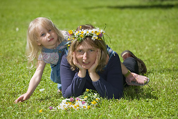 Image showing daughter plays with mum