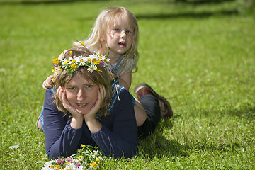 Image showing daughter plays with mum