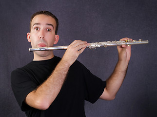 Image showing Man Playing Flute