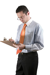 Image showing Businessman with clipboard on hand