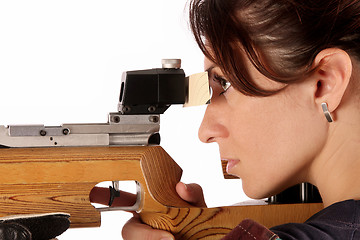 Image showing woman aiming a pneumatic air rifle