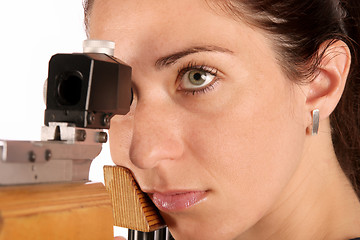 Image showing woman aiming a pneumatic air rifle