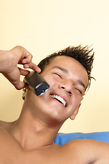 Image showing Young man on the phone