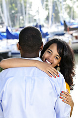 Image showing Happy woman hugging man