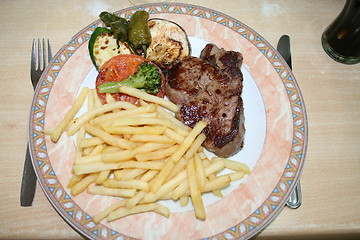 Image showing Beef, chips and vegetables