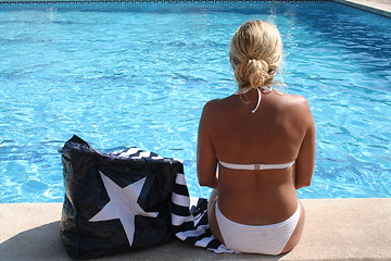 Image showing Girl beside swimming pool