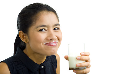 Image showing woman drinking milk, isolated on white