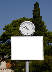 Image showing Clock and banner