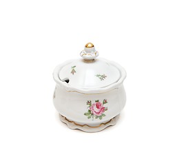 Image showing White porcelain sugar basin with roses isolated