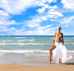 Image showing Woman enjoying the sea